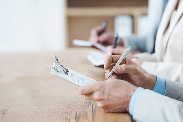 People filling out a form